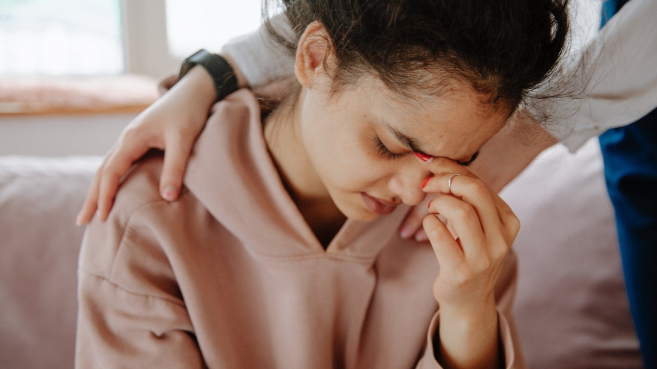 therapist comforting patient