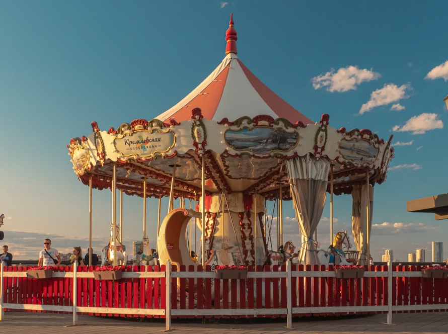 retro merry go round on boardwalk